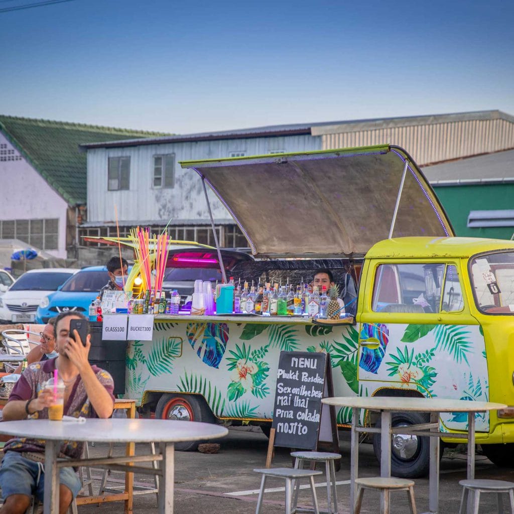 Phuket weekend market tour — Naka night market stalls at dusk