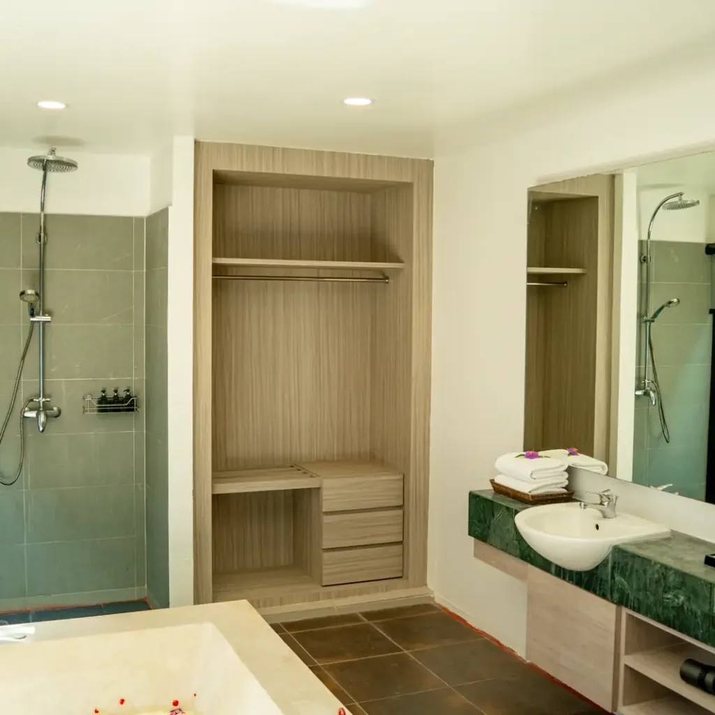 Walk-in shower and twin-vanity bathroom